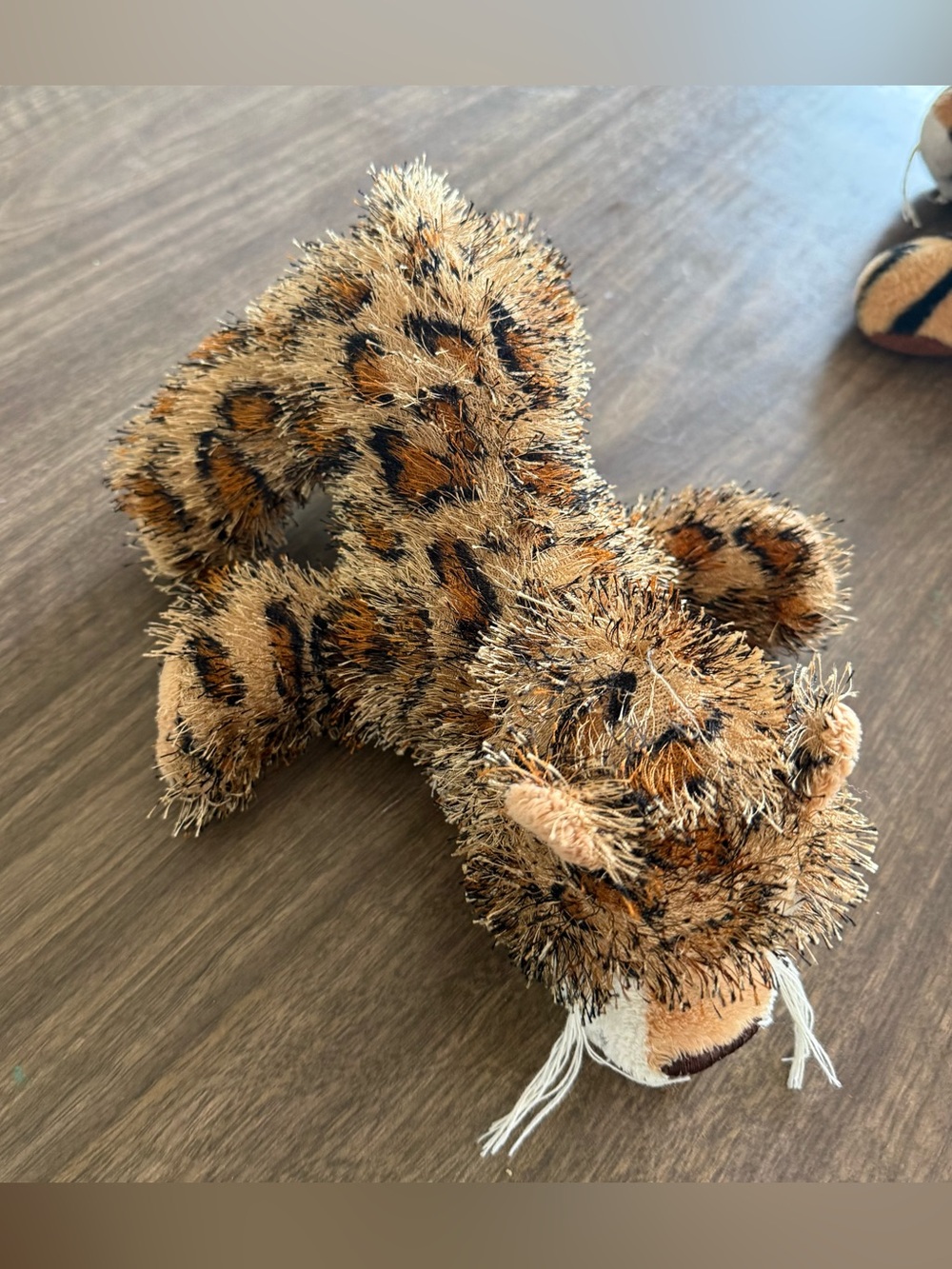 GANZ Brown and Tan Leopard Plush Tag Close-Up